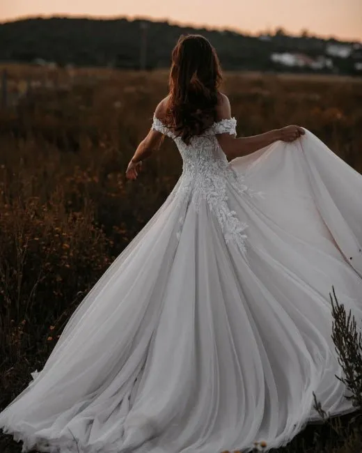 Luolandi A Line Tulle Off The Shoulder Floor Length Wedding Dresses With Lace & Pearls Sexy