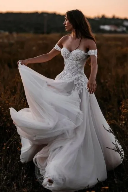 Luolandi A Line Tulle Off The Shoulder Floor Length Wedding Dresses With Lace & Pearls Sexy