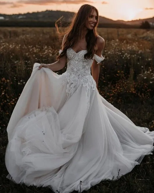 Luolandi A Line Tulle Off The Shoulder Floor Length Wedding Dresses With Lace & Pearls Sexy