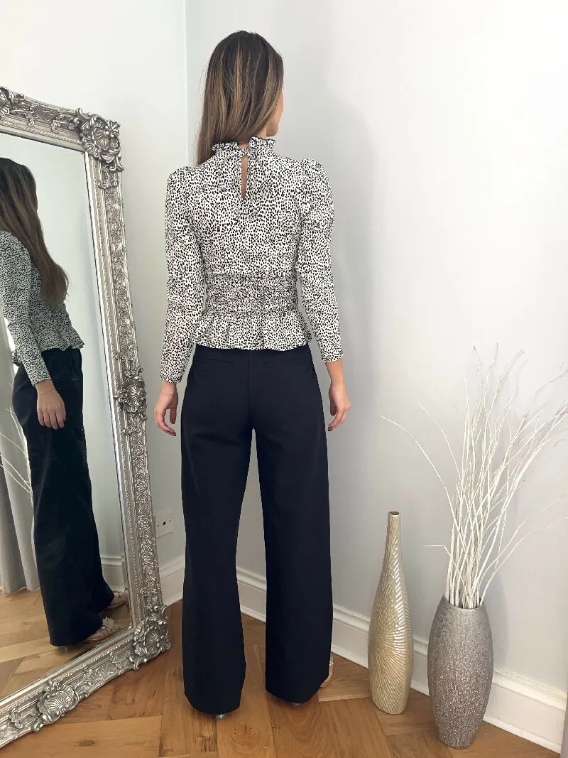 Monochrome Smocked Peplum Blouse
